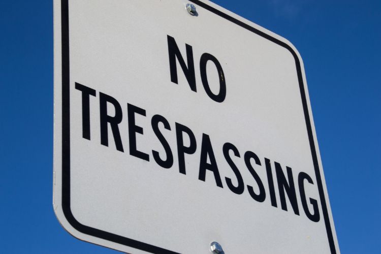 no trespassing sign board