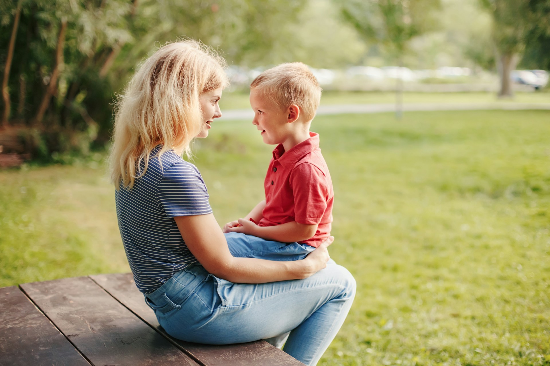 Strategies for Winning a Child Custody Battle in Arizona Mother and son sitting together outdoors, illustrating family law topics relevant to child custody in Arizona.