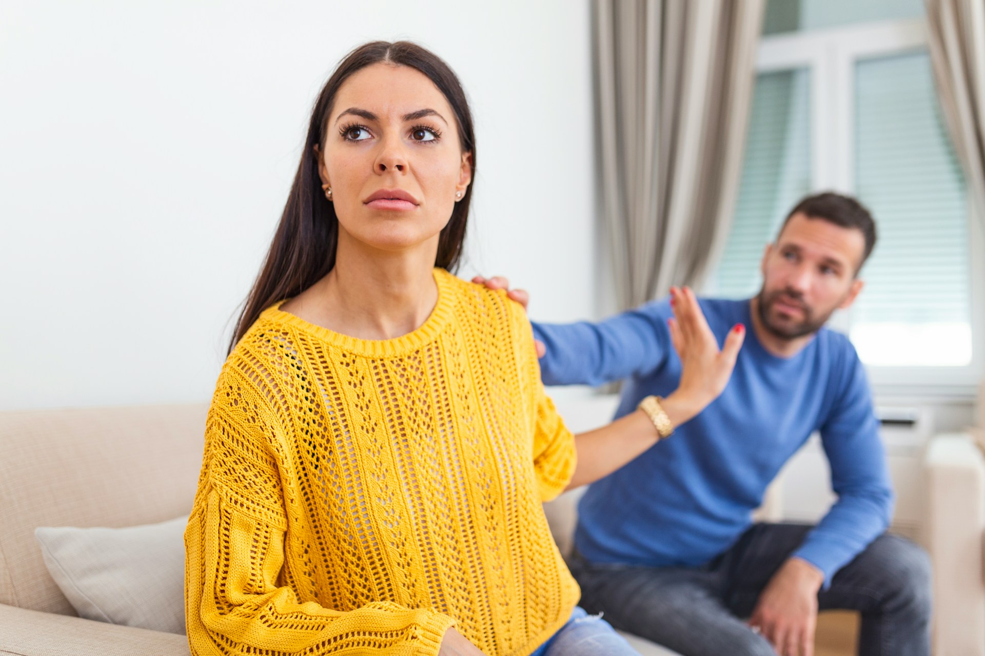 Common Challenges in High-Conflict Divorces Couple in conflict during a Mesa, Arizona family law consultation, illustrating challenges in high-conflict divorces.