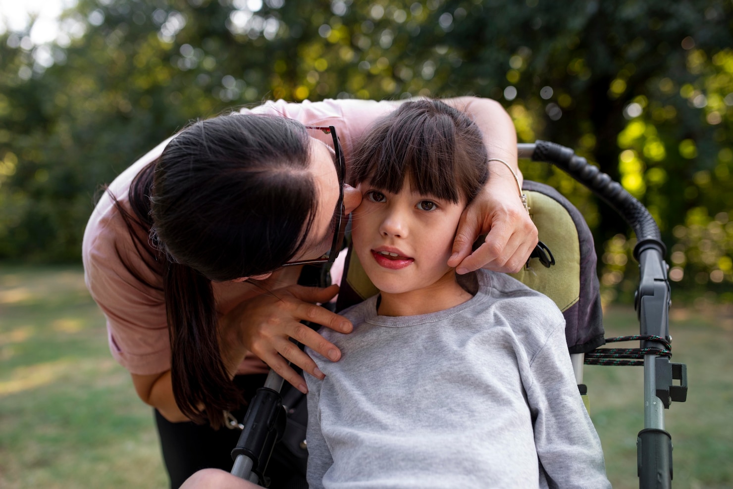 Mother comforting child in stroller, highlighting the importance of special needs trust in Arizona for loved ones.